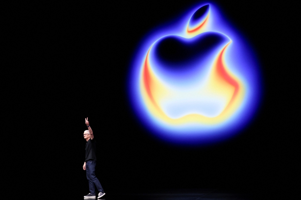 Apple CEO Tim Cook gestures as Apple holds an event at the Steve Jobs Theater on its campus in Cupertino, California, US September 9, 2025. — Reuters pic