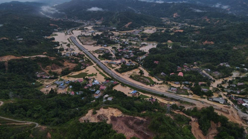 Flood-prone Penampang district has once again been hit by floods after days of intermittent rain. — Picture by Philip Chin
