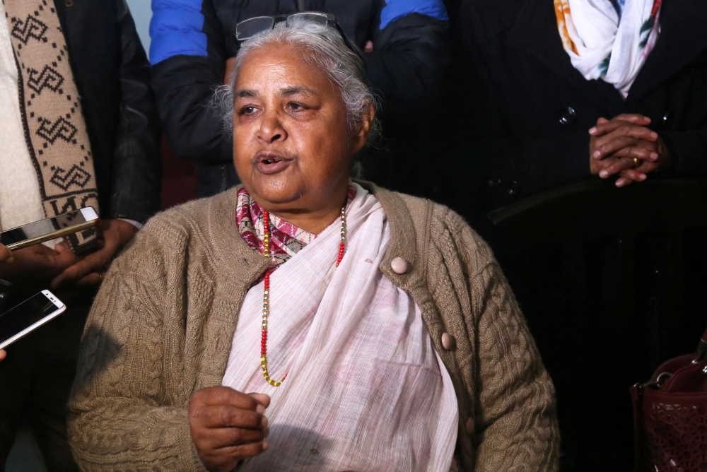 Former Chief Justice of Nepal Sushila Karki speaks with the media after meeting Doctor Govinda KC, who is on a hunger strike for medical sector reforms, in Kathmandu on January 30, 2019. — Reuters pic