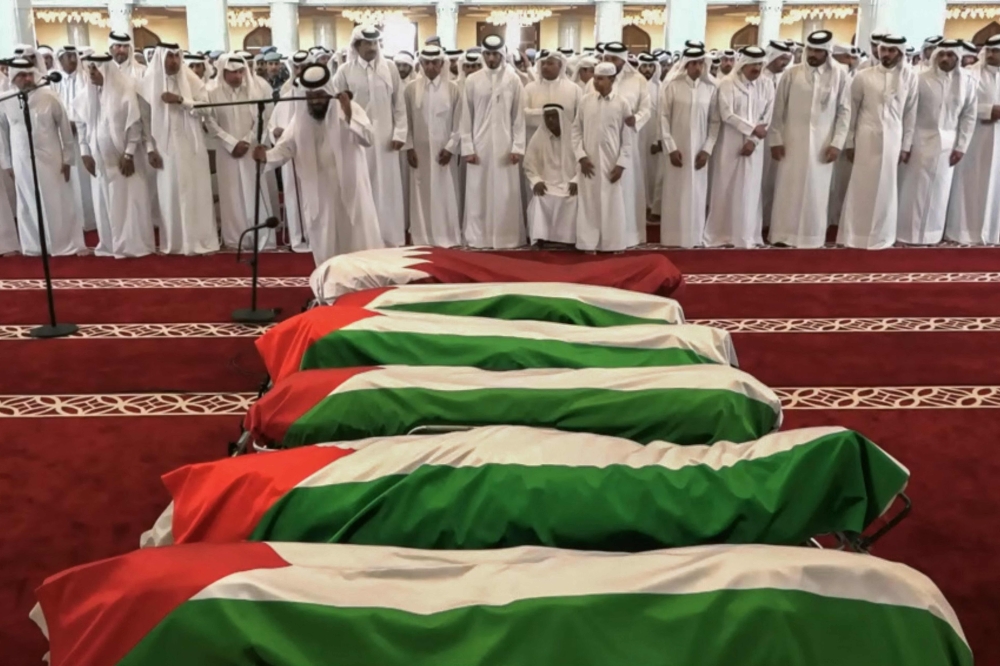 This grab from footage released by Qatar TV shows Qatar’s Emir Sheikh Tamim bin Hamad Al-Thani attending the funeral of people killed in an Israeli strike on figures of the Palestinian Hamas movement two days earlier, at Sheikh Mohammed bin Abdul Wahhab Mosque in Doha on September 11, 2025. — Qatar TV handout pic via AFP 