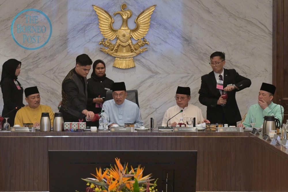 Prime Minister Datuk Seri Anwar Ibrahim chairs the MA63 meeting in Kuching, Sarawak on September 12, 2-25 while (from left) Hajiji, Abang Johari and Fadillah look on. — Sarawak Information Department pic via The Borneo Post
