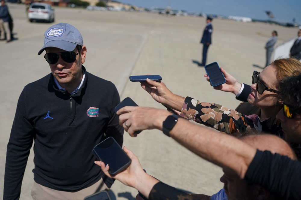 US Secretary of State Marco Rubio speaks to members of the media before departing for Israel at Joint Base Andrews, Maryland, on September 13, 2025. — AFP pic