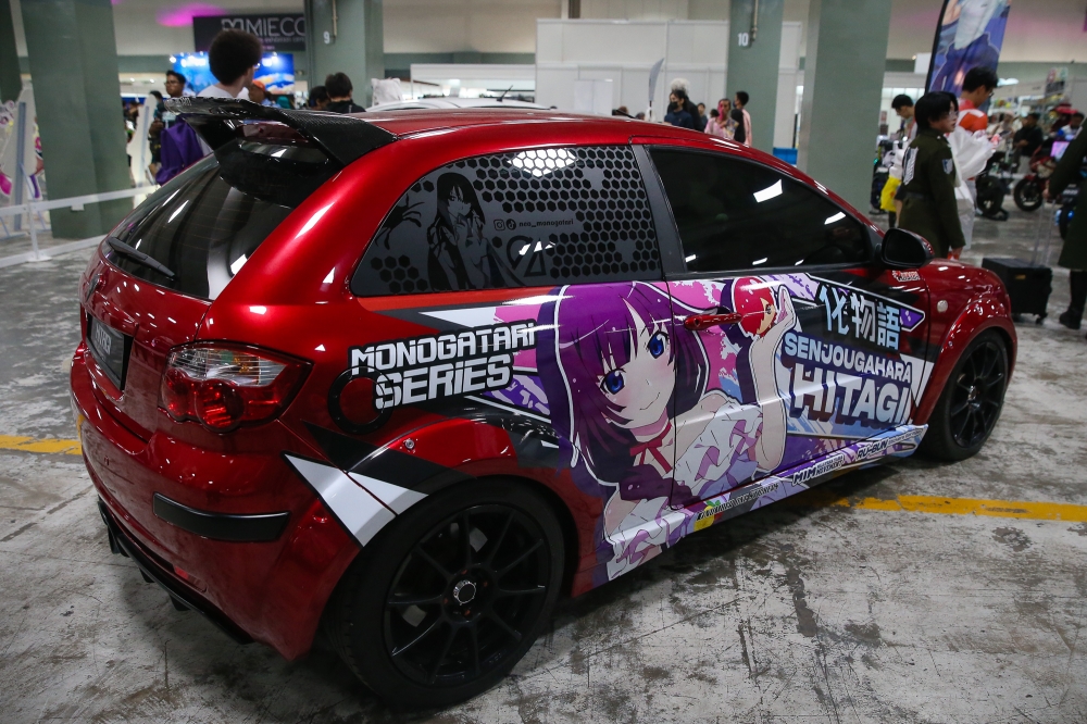 A Proton Satria Neo itasha on display at the Mines International Exhibition and Convention Centre (MIECC) during AniManGaki 2025. — Picture by Yusof Isa
