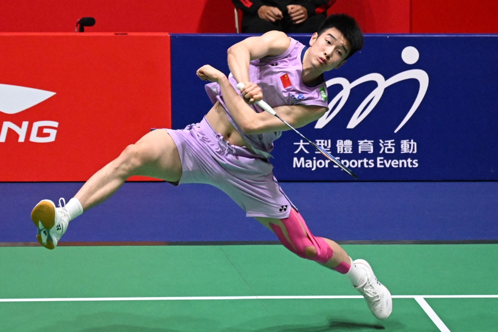 China’s Li Shifeng returns a shot to India’s Lakshya Sen during their men’s singles final at the Hong Kong Open in Hong Kong, September 14, 2025. — AFP pic