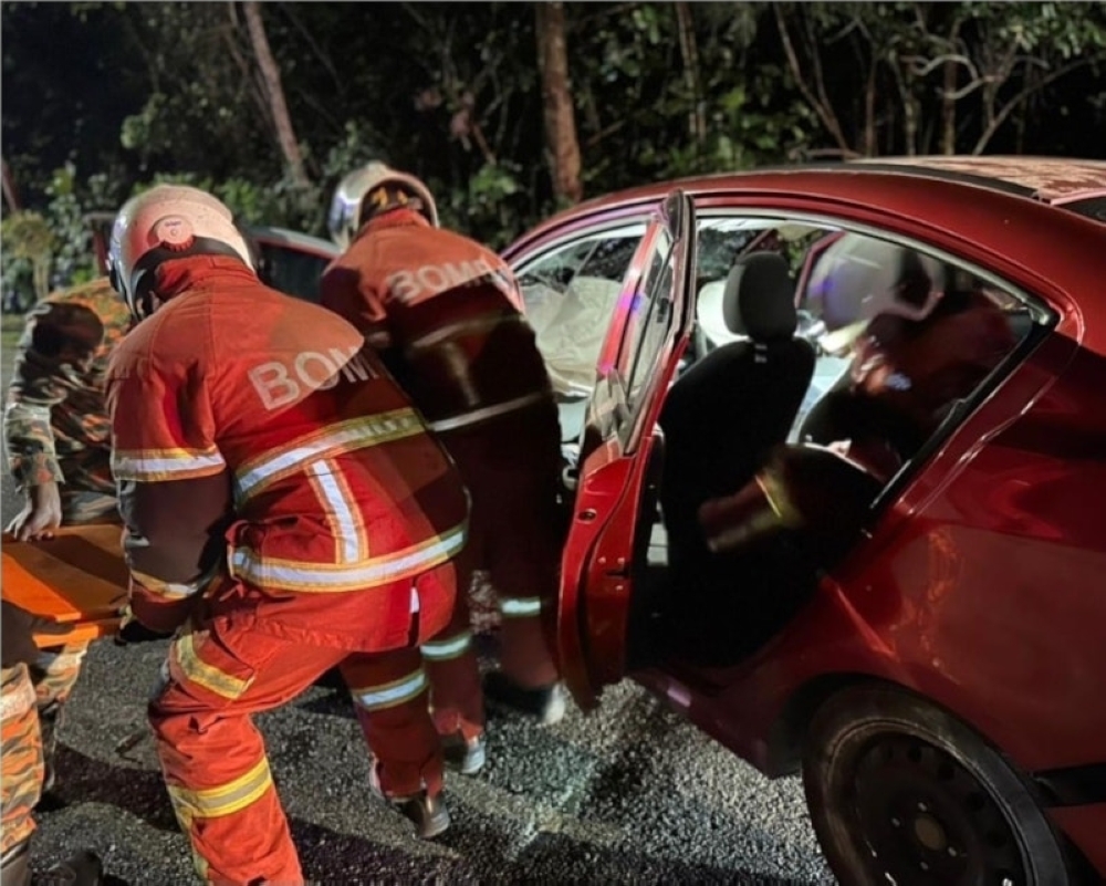 In the 7.41pm crash, the victim, identified as Maja, was trapped in the driver’s seat before being extricated by firefighters using specialised rescue equipment. — Picture from Facebook/Bintulu news page 
