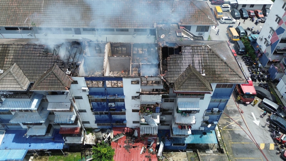 Six flats torched in Taman Pinggiran Batu Caves, police investigating ...