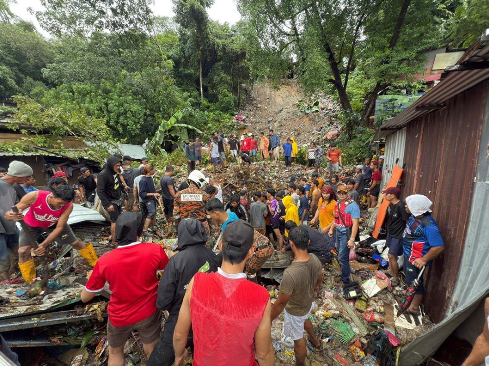 The Sabah government is providing RM1,000 in compassionate aid to each family evacuated to temporary shelters, and RM10,000 to the next of kin of those killed, following floods and landslides that have swept across the state since last week. — Picture courtesy of Bomba