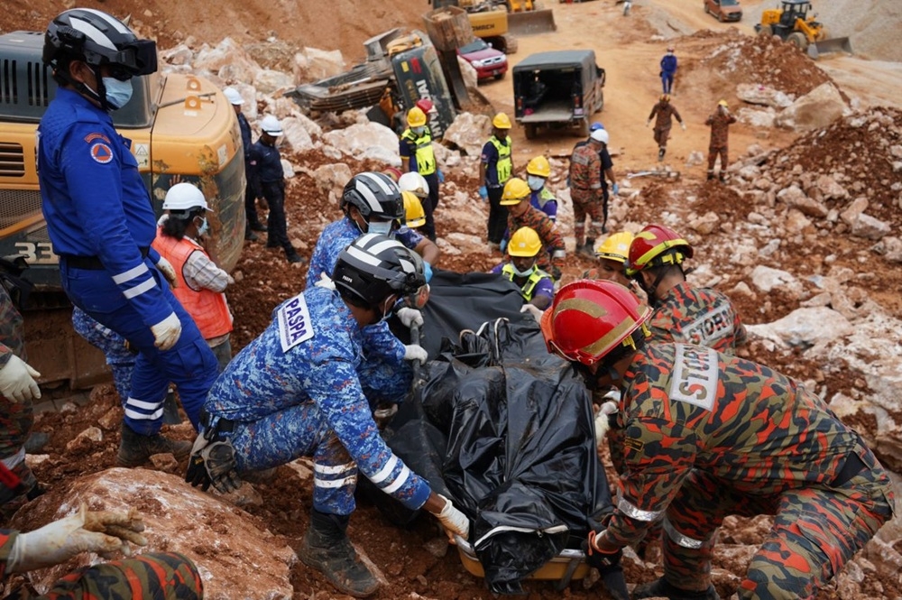 The excavator driver who was reported buried in a rockfall at a quarry site in Ulu Gali, Sungai Ruan, Raub, was found dead today. — Picture courtesy of Fire and Rescue Department
