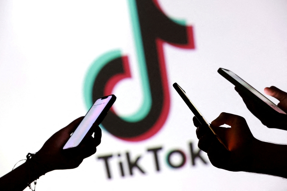 US President Donald Trump made it clear he would let TikTok, which counts 170 million US users, go dark without a deal to switch to US-controlled ownership. — Reuters pic
