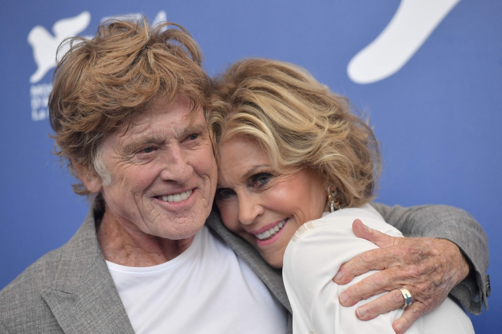 In this file photo taken on September 1, 2017, U.S. actors Jane Fonda and Robert Redford attend a photocall during the 74th Venice Film Festival in Venice. — AFP pic