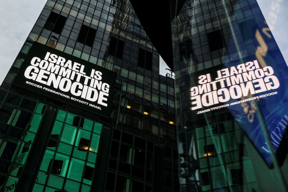 A billboard in Times Square displays the message ‘Israel is committing genocide’ as part of the campaign by Game Over Israel calling for a boycott of Israel by national football federations over the war in Gaza, in New York City, September 16, 2025. Israel is fighting a genocide case at the International Court of Justice in The Hague and has rejected such accusations, citing its right to self-defence following the deadly October 7, 2023, Hamas attack. — Reuters pic 