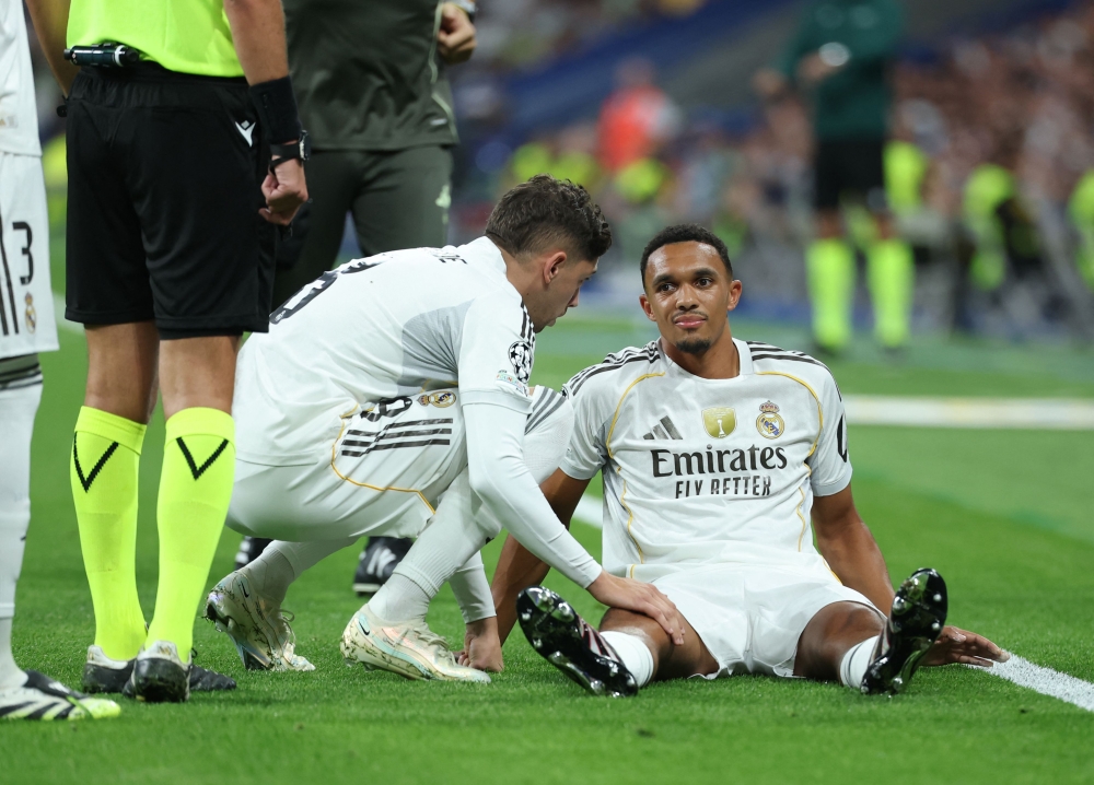 Real Madrid’s English defender Trent Alexander-Arnold reacts on the ground after suffering an injury during the Uefa Champions League first round day 1 football match between Real Madrid CF and Olympique de Marseille at the Santiago Bernabeu stadium in Madrid on September 16, 2025. — AFP pic