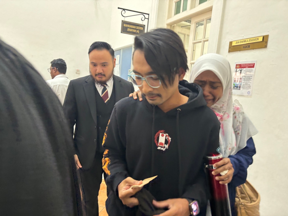 Muhammad Ikbal Izzuddin Abd Rahman, 29, discharged and acquitted by the Sessions Court in Ipoh, Perak, on two charges of sexual assault involving a 13-year-old male student in 2020. — Picture by John Bunyan