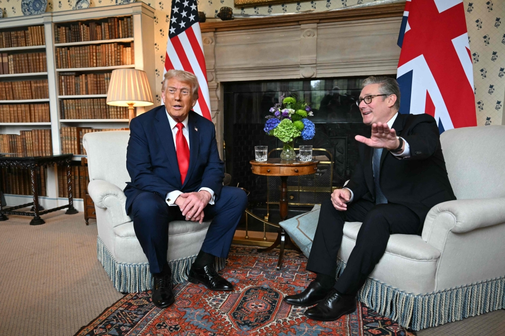 Britain’s Prime Minister Keir Starmer and US President Donald Trump sit down for a bilateral meeting at Chequers, in Aylesbury, central England, on September 18, 2025. — AFP pic