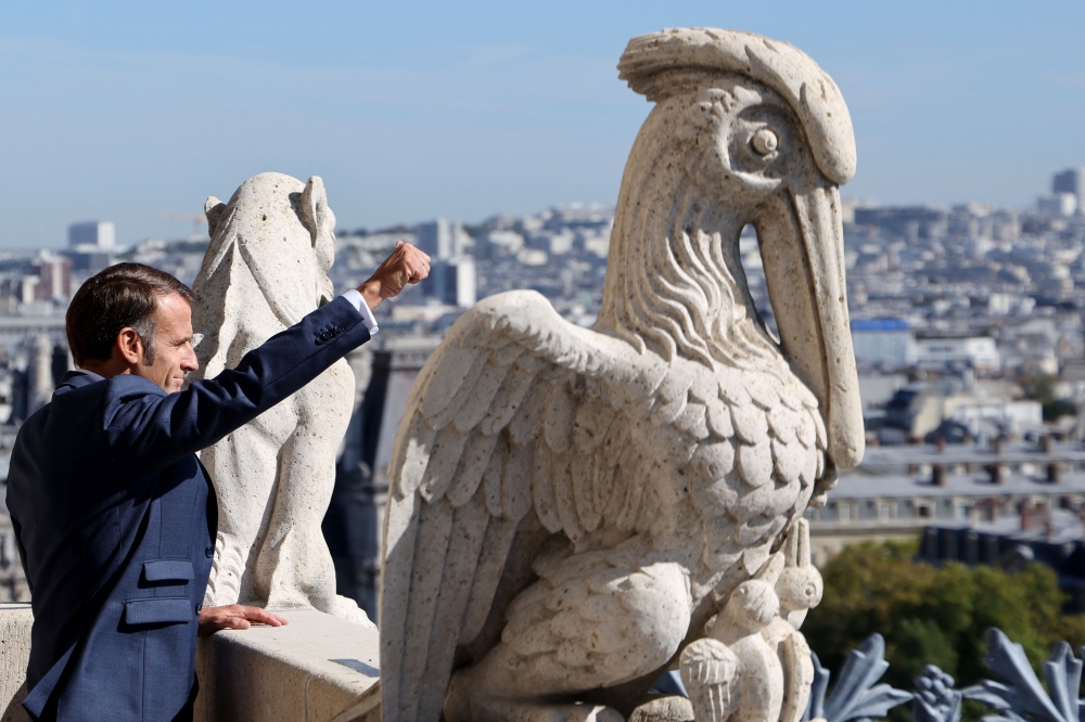French President Emmanuel Macron on Friday reopened the two great mediaeval towers of the Notre-Dame cathedral in Paris for public visits. — AFP pic