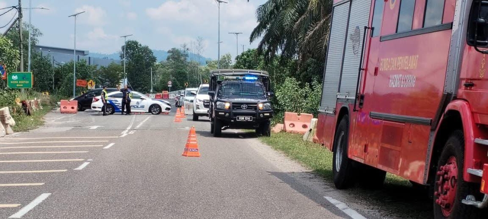 Emergency vehicles at the Kerteh ECRL site following a butane pipeline leak. Authorities have cordoned off the area and closed the main road as a precaution. — Picture via Facebook