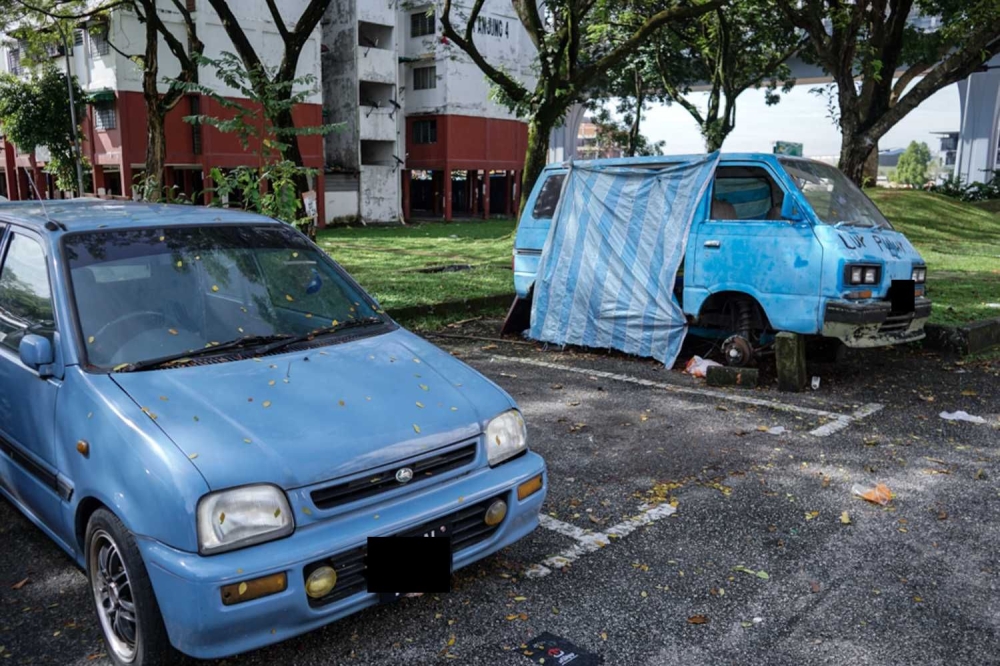 Anthony Loke said the Strata Scheme for Abandoned Vehicles will allow residents to dispose of old cars safely and quickly while reducing health and safety risks in high-density housing areas. — Picture by Ahmad Zamzahuri
