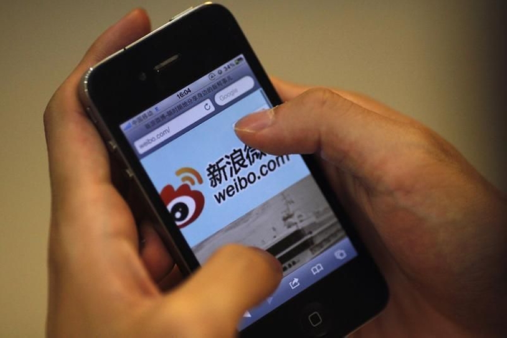 China’s internet regulator said today it would take ‘disciplinary and punitive measures’ against popular apps Weibo and Kuaishou for highlighting celebrity news and ‘undesirable’ content, extending a crackdown on social media platforms. — Reuters pic  