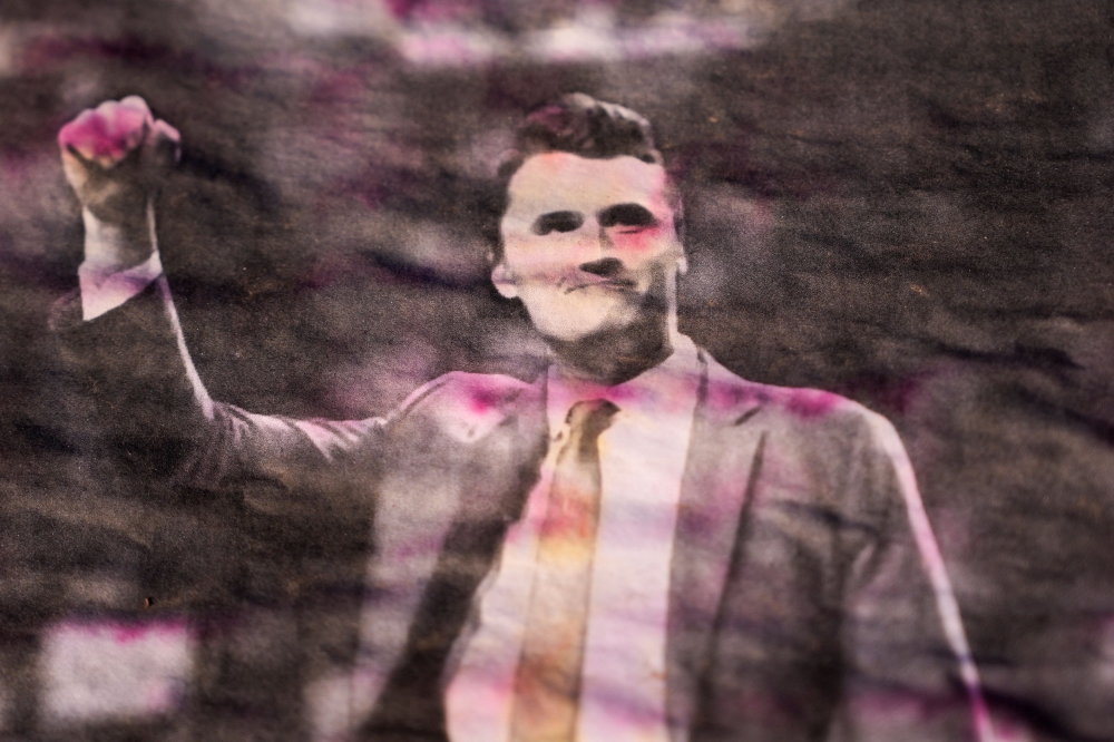 A poster with the picture of slain conservative commentator Charlie Kirk is displayed in tribute at the headquarters of Turning Point USA, ahead of a memorial service for him which is to be held on September 21, in Phoenix, Arizona September 20, 2025. — Reuters pic 