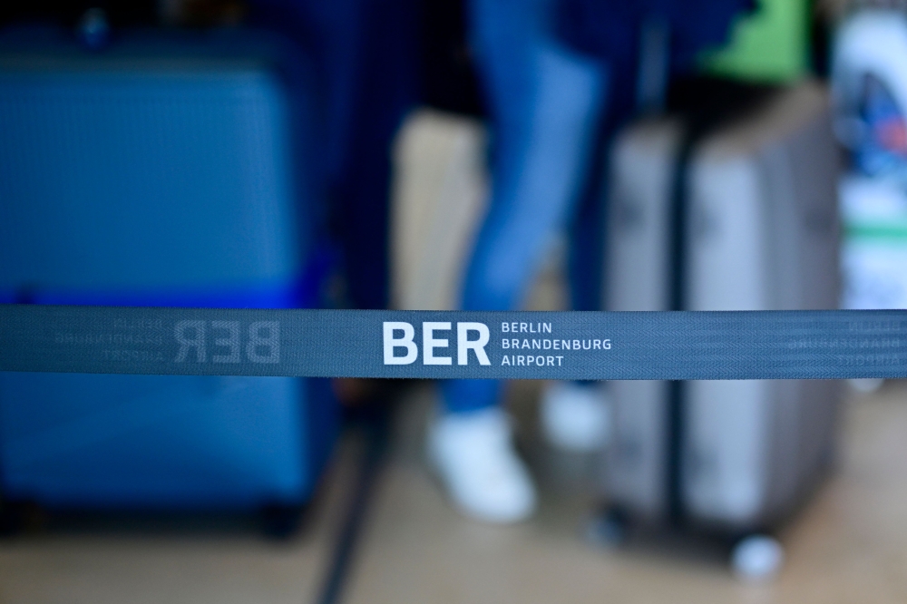 The airport logo is seen on a cordon at the Berlin Brandenburg BER airport Willy-Brandt in Schoenefeld, southeast of Berlin, on September 20, 2025, after major European airports were hit by ‘cyber-related disruption’ affecting automated check-in and baggage drop systems and causing delays. — AFP pic 
