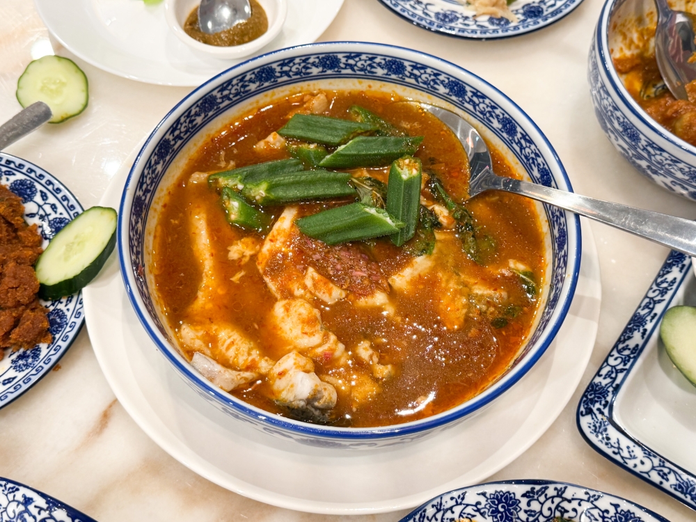 Set meals offered at Ivy’s Nyonya Cuisine Petaling Jaya include Gulai Tumis Assam with seabass for two people. — Picture by Lee Khang Yi