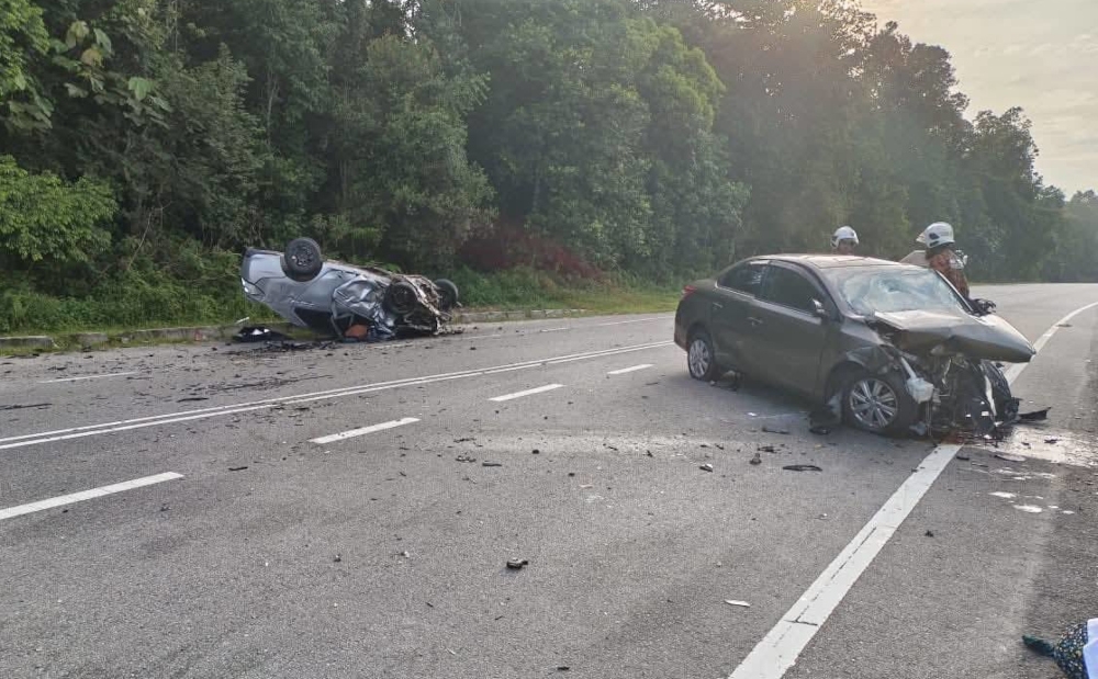 Both victims were trapped in their vehicles and had to be extricated by firefighters using rescue equipment. — Picture from Facebook/Penyulam Aksara