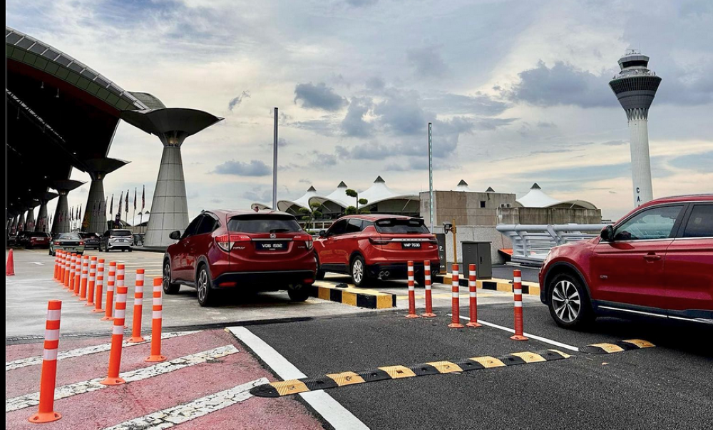 Vehicles are seen approaching the drop-off/pick-up area of the Kuala Lumpur International Airport. — KLIA pic