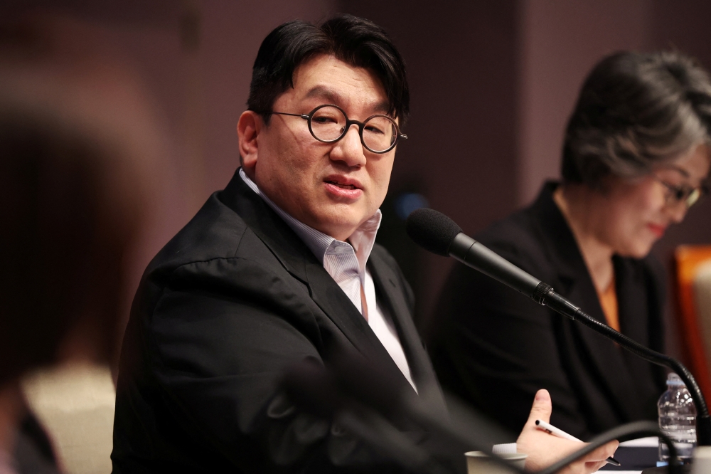 According to Yonhap News Agency, HYBE chairman Bang Si-hyuk appeared at the Seoul Metropolitan Police office in the city’s western district yesterday as a suspect under investigation for possible violations of the Capital Market Act. — Reuters pic
