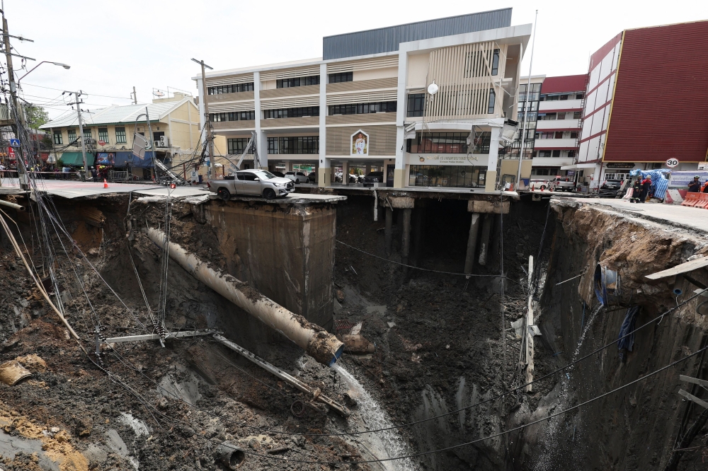 A massive sinkhole opens on Samsen Road near Vajira Hospital, in Bangkok September 24, 2025. — Reuters pic  