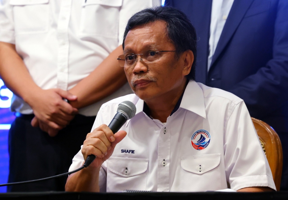 Parti Warisan Sabah President Datuk Seri Mohd Shafie Apdal speaks at a press conference for the signing of a unity government document at the Perdana Putra Building in Putrajaya on Dec 16, 2022. — Bernama pic