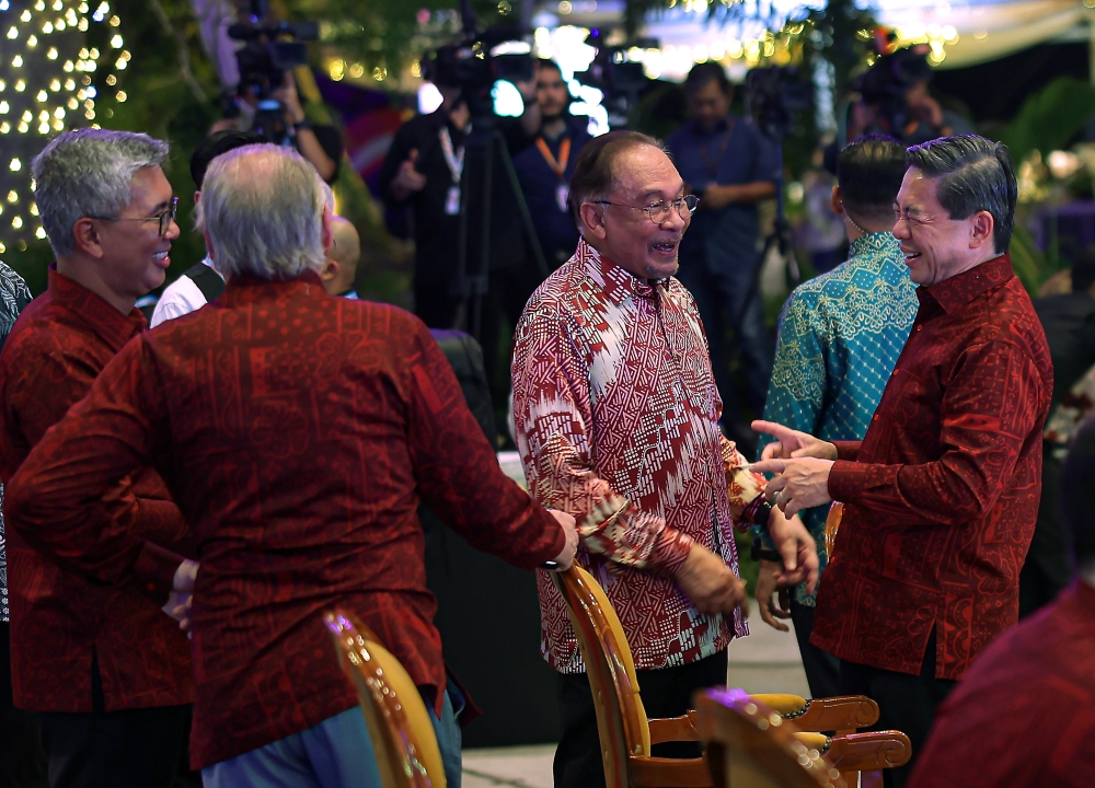 Prime Minister Datuk Seri Anwar Ibrahim exchanges pleasantries with Brunei’s Minister Dato Dr Amin Liew Abdullah at the 57th ASEAN Economic Ministers’ Meeting gala dinner in Kuala Lumpur on September 24, 2025. — Bernama pic