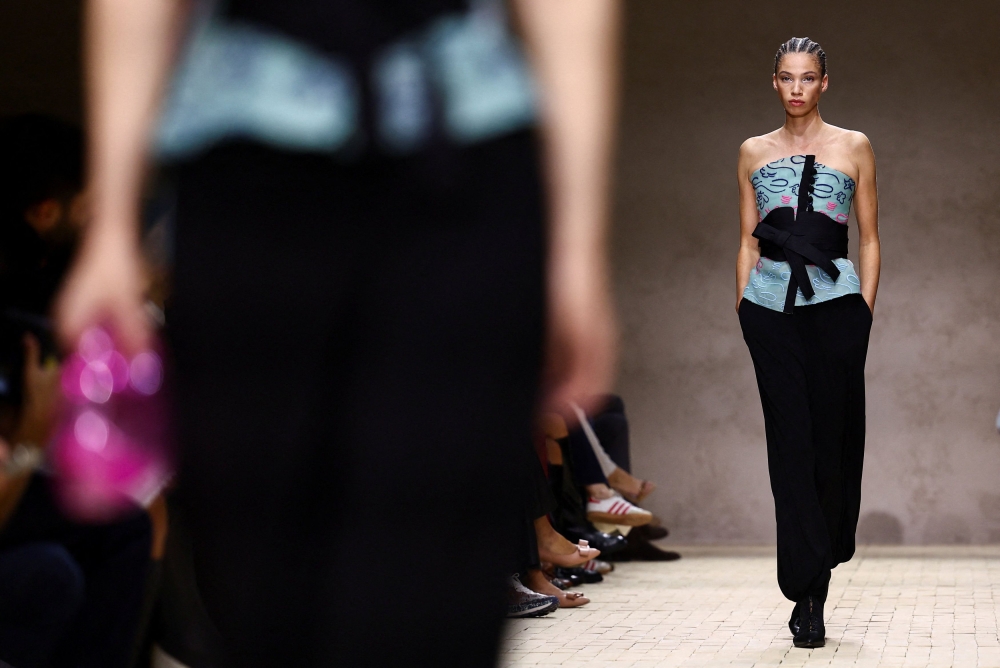 A model presents a creation from the Emporio Armani Spring/Summer 2026 collection during Milan Fashion Week September 25, 2025. — Reuters pic