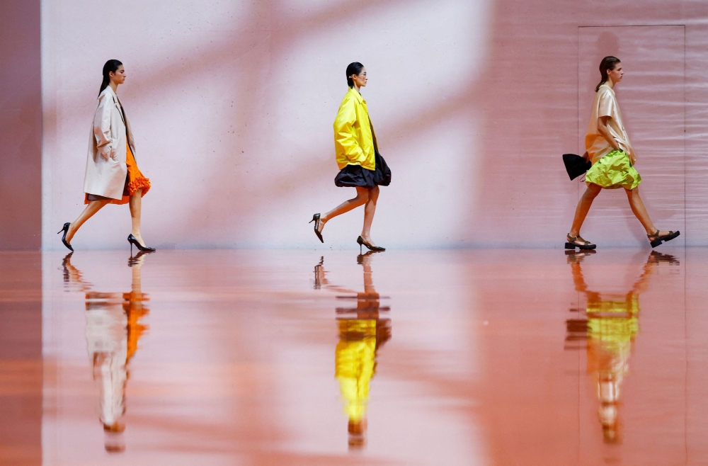 Models present creations from the Prada Spring/Summer 2026 collection during Milan Fashion Week September 25, 2025. — Reuters pic