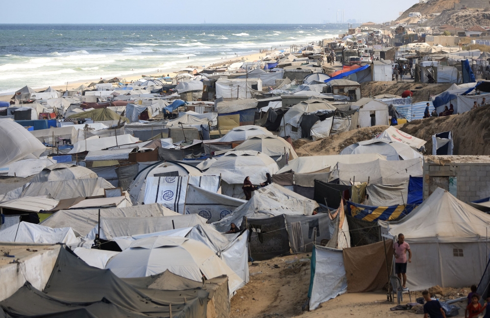 Palestinians, displaced by the Israeli military offensive, take shelter in a tent camp, in Zawaida in the central Gaza Strip, September 25, 2025. Malaysia has contributed more than RM70 million in financial and humanitarian assistance to Palestine since 2024, said Foreign Minister Datuk Seri Mohamad Hasan. — Reuters pic