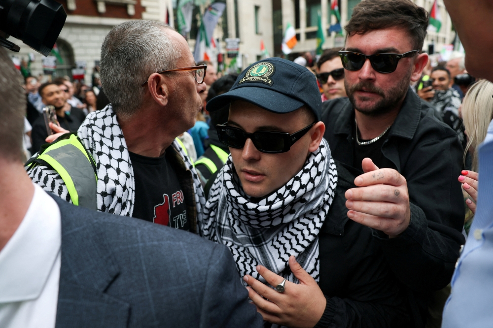 Liam O’Hanna, 27, who performs under the stage name Mo Chara, was charged in May after being accused of displaying a flag of the Iran-backed Lebanese group during a London concert in November. — Reuters pic