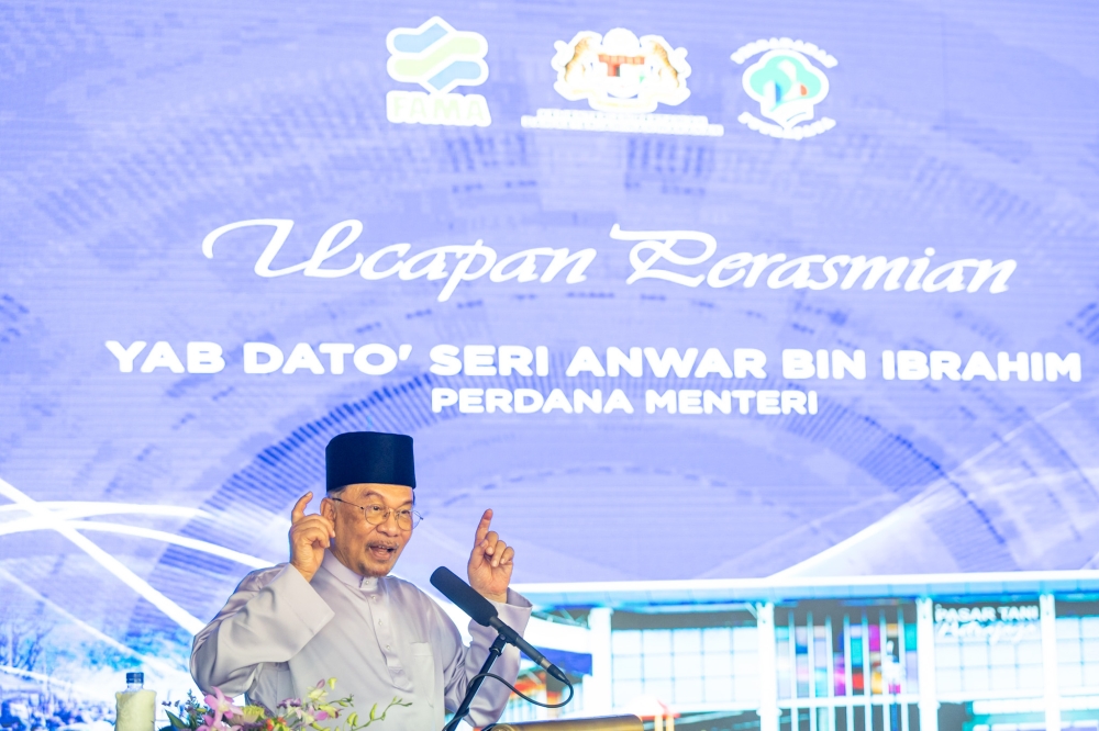 Prime Minister Datuk Seri Anwar Ibrahim speaks at the 40th National Farmers’ Market anniversary and the launch of Putrajaya Farmers’ Market at Precinct 4 in Putrajaya, September 26, 2025. — Picture by Firdaus Latif