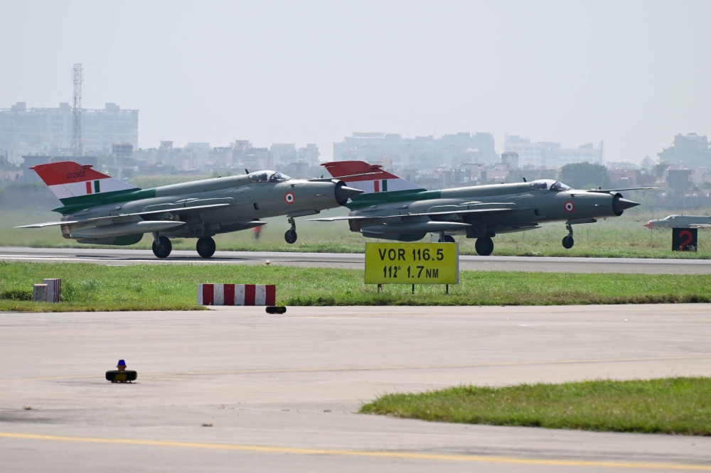 India’s MiG-21 fighter jets prepare to take off for the last flypast during their farewell ceremony at the Chandigarh Air Force Station in Chandigarh, September 26, 2025. — AFP pic