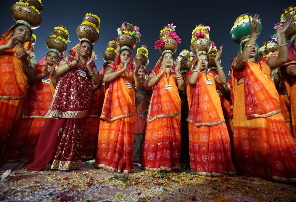 Hindu devotees perform Garba, a traditional folk dance, during the celebrations to mark the Navaratri festival at Surat in Gujarat, India on October 17, 2018. — Reuters pic
