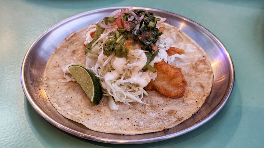 The battered fish ‘taco’, done Baja style, is one of the best fish ‘tacos’ around. — Picture by Ethan Lau