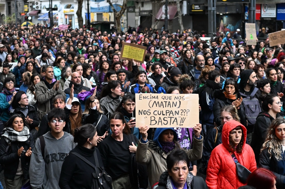 People attend a demonstration in Buenos Aires on September 27, 2025, called by rights groups under the banner: 
