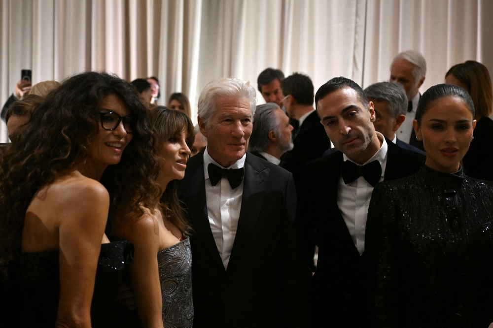 Italian-Tunisian former model and television presenter Afef Jnifen, Richard Gere’s wife Spanish Alejandra Silva, US actor Richard Gere, Saudi arabian film producer Mohammed Al Turki and Mexican actress Eiza Gonzalez  pose after the Giorgio Armani collection show at Milan’s Fashion Week at the Pinacoteca di Brera Museum on September 28, 2025 in Milan. — AFP pic 