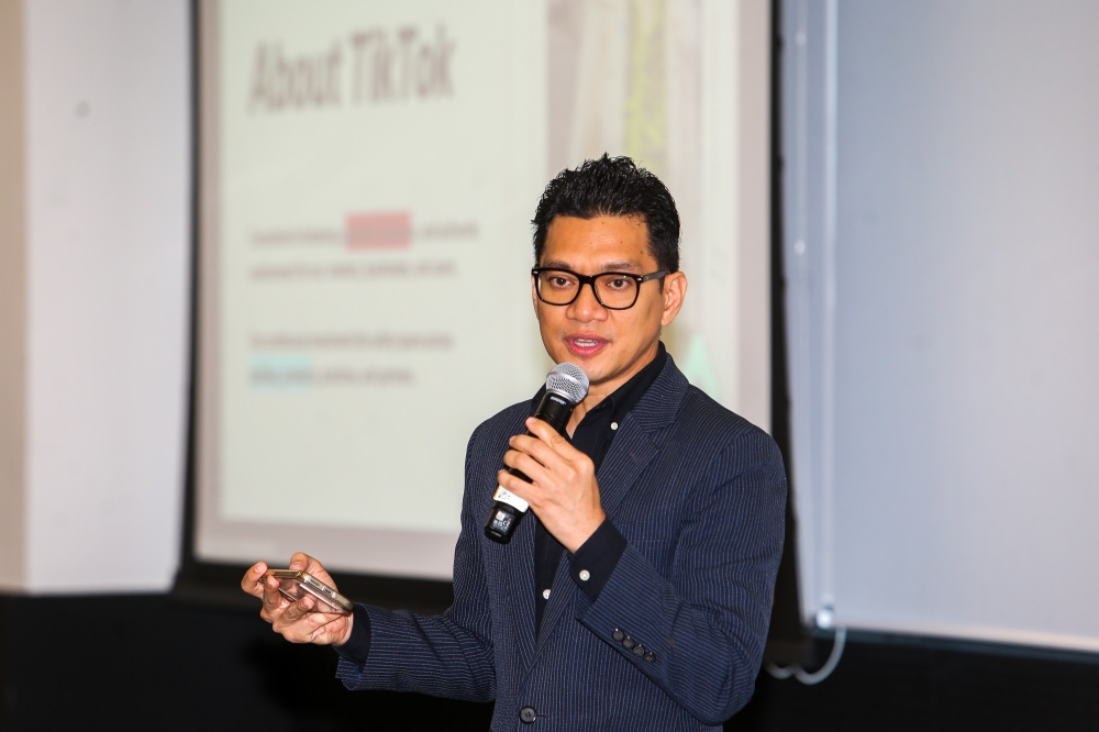 TikTok Malaysia public policy head Firdaus Fadzil speaks at TikTok’s #ThinkTwice media briefing on scam prevention in Kuala Lumpur September 29, 2025. — Picture by Choo Choy May