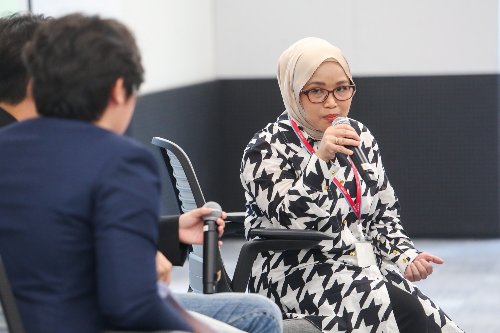 TikTok content creator Wan Fatin Sufina speaks at TikTok’s #ThinkTwice media briefing on scam prevention in Kuala Lumpur September 29, 2025. — Picture by Choo Choy May