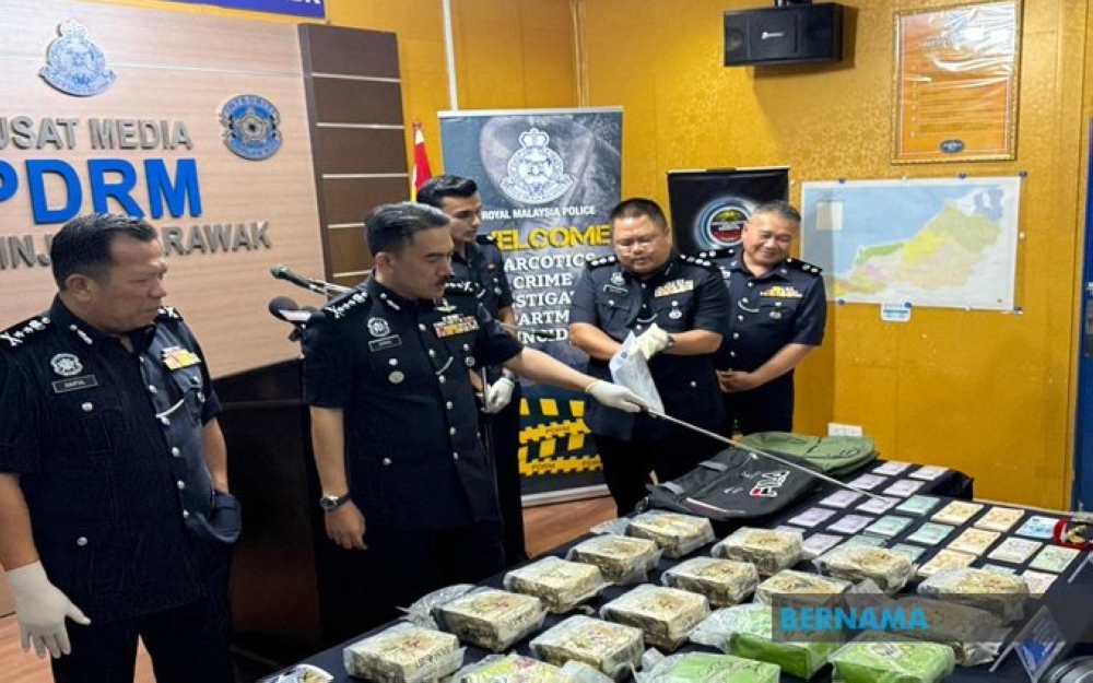 Sarawak police have arrested two men and seized 20.6 kilogrammes of methamphetamine worth RM783,218 in two raids in Serian and Kuching. — Bernama pic