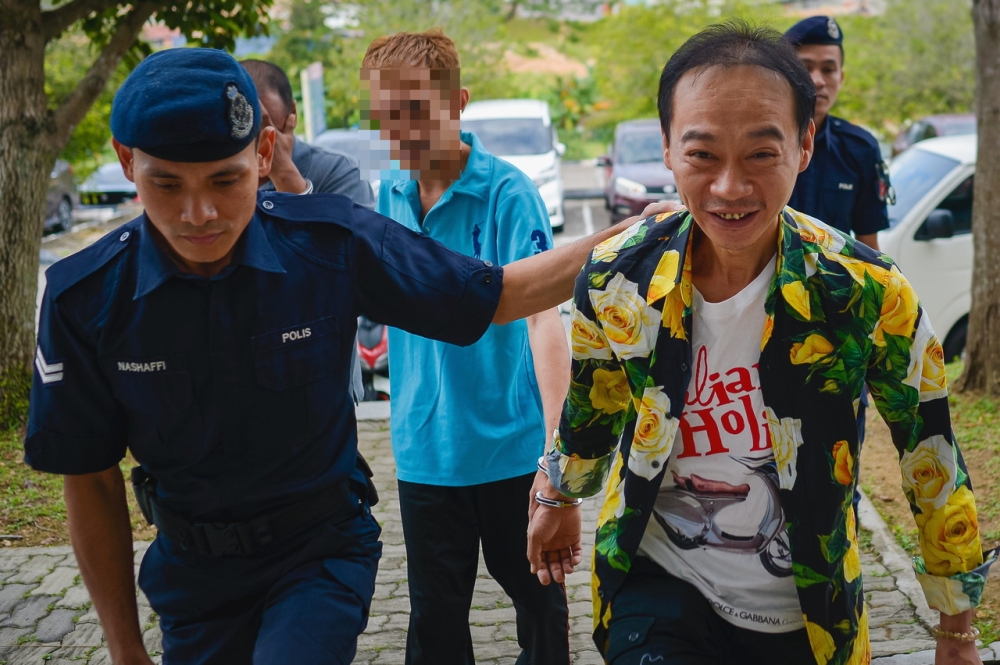 Lin Weida, 41, a travel agent, made the plea before Judge Ahmad Fuad Othman after both charges were read out in Mandarin by an interpreter. — Bernama pic
