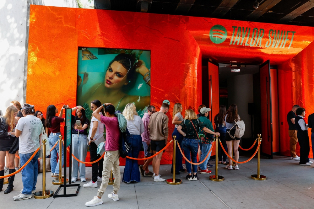 People wait to enter a Spotify pop-up event for Taylor Swift’s album ‘The Life of a Showgirl’ in New York September 30, 2025. — Reuters pic