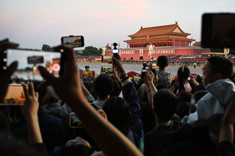 Xinhua said visa-holders will be able to 'engage in exchanges in fields such as education, culture, and science and technology, as well as relevant entrepreneurial and business activities'. — AFP pic