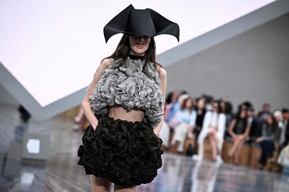 A model presents a creation by Dior for the Women Ready-to-wear Spring-Summer 2026 collection as part of the Paris Fashion Week October 1, 2025. — AFP pic