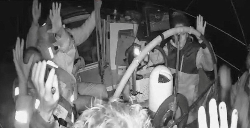 A screengrab from a live stream video shows crew of a Gaza-bound vessel, part of the Global Sumud Flotilla, raise their hands as they are surrounded by Israel Defense Forces, October 2, 2025. — Global Sumud Flotilla handout pic via Reuters 