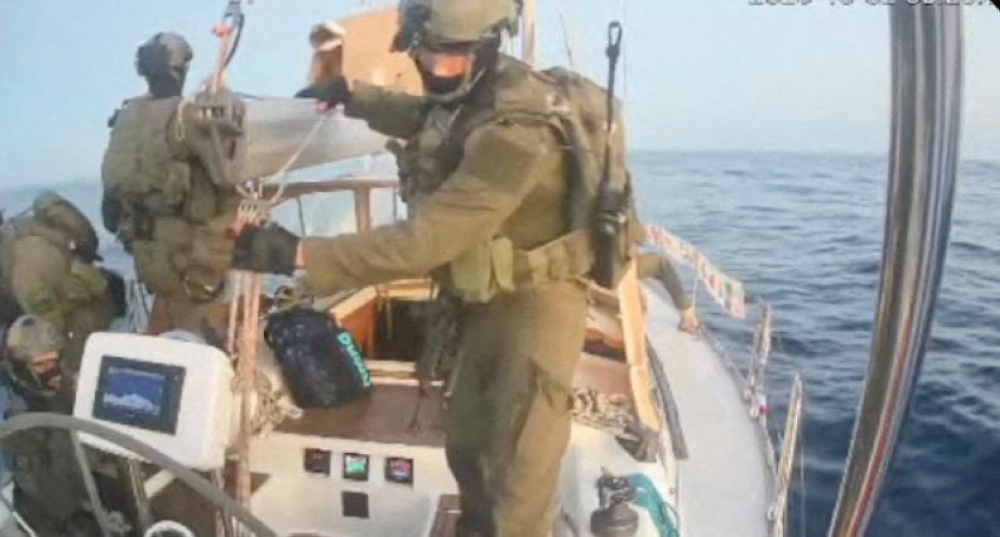 A screengrab from a live stream video shows people in uniform aboard the Gaza-bound vessel ‘Oxygono’, which flotilla organisers reported as intercepted on October 2, 2025. — Reuters pic